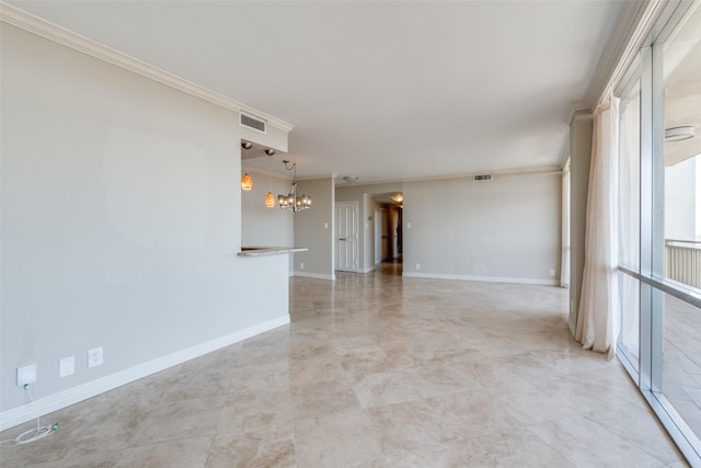 spare room featuring ornamental molding