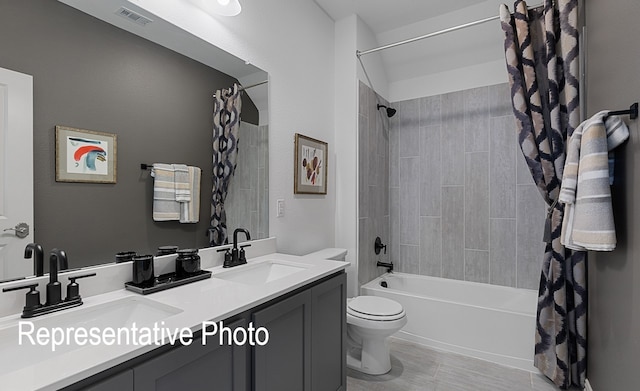 full bathroom featuring vanity, toilet, and shower / bath combo