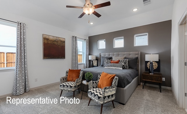 bedroom featuring vaulted ceiling, carpet, and ceiling fan