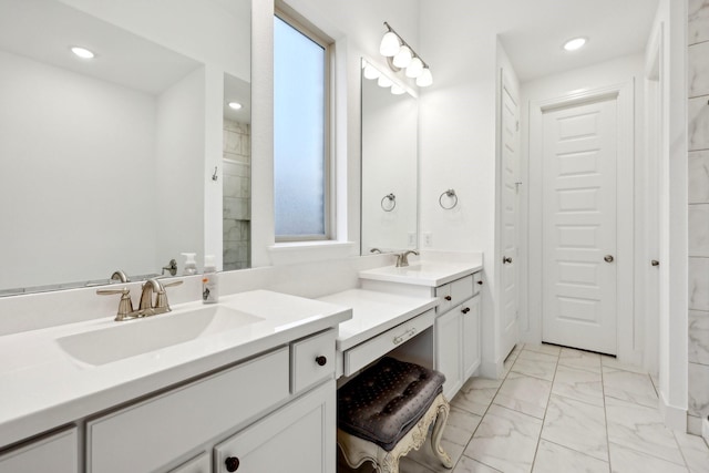 bathroom with vanity and walk in shower