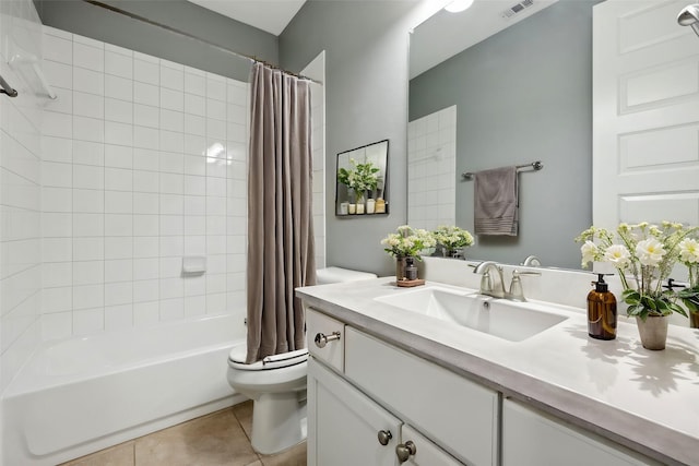 full bathroom with tile patterned flooring, vanity, shower / bath combination with curtain, and toilet