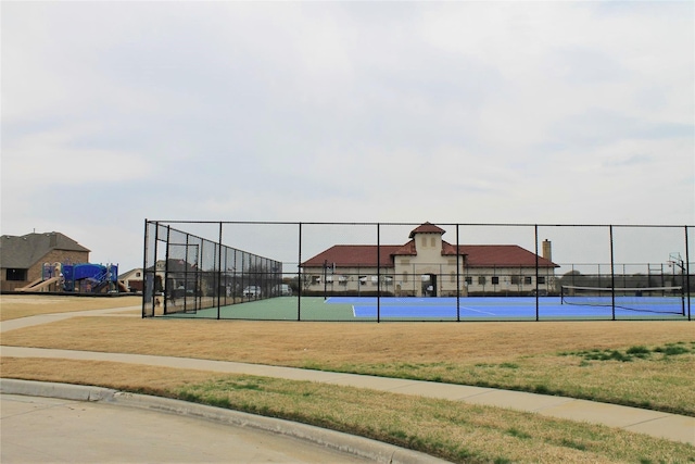 exterior space featuring tennis court