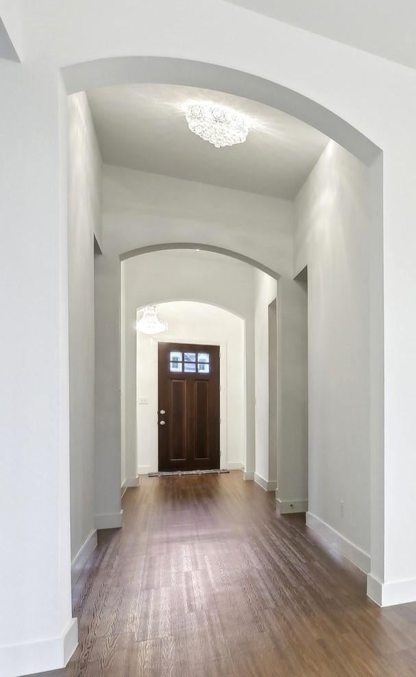 foyer entrance featuring hardwood / wood-style floors