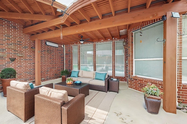 view of patio / terrace featuring an outdoor living space and ceiling fan