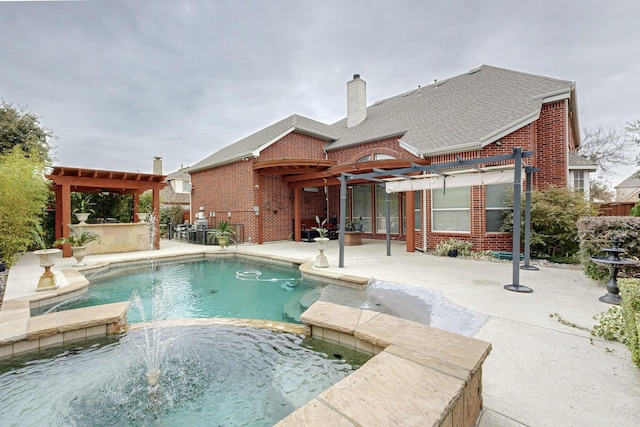 view of pool with a patio, exterior bar, an in ground hot tub, and a pergola