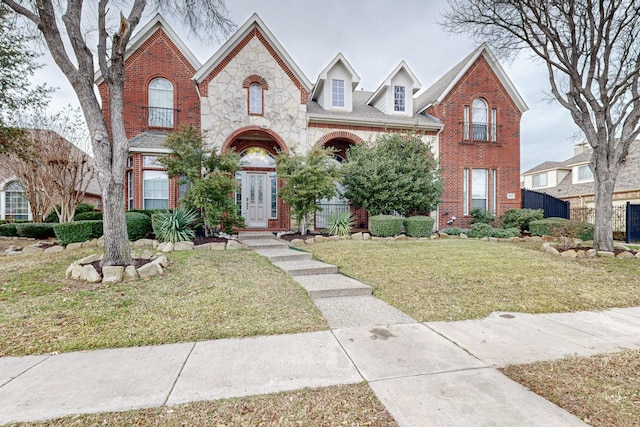 view of front of home with a front lawn