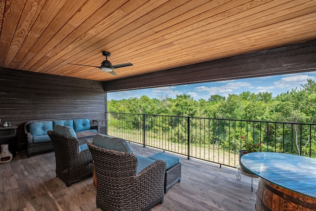 deck with ceiling fan and an outdoor hangout area