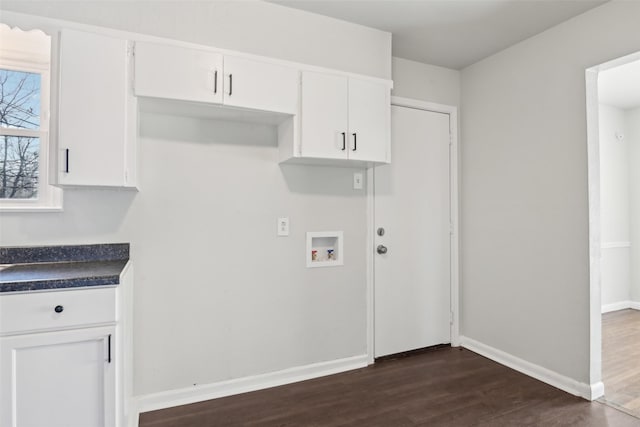 clothes washing area featuring hookup for a washing machine and dark hardwood / wood-style floors