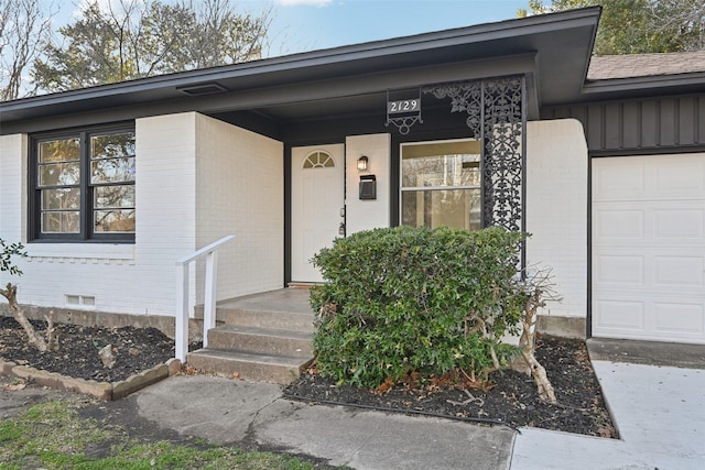 property entrance featuring a garage