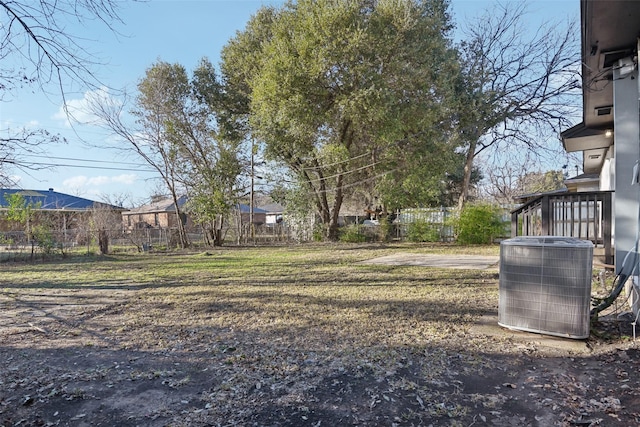 view of yard with central air condition unit