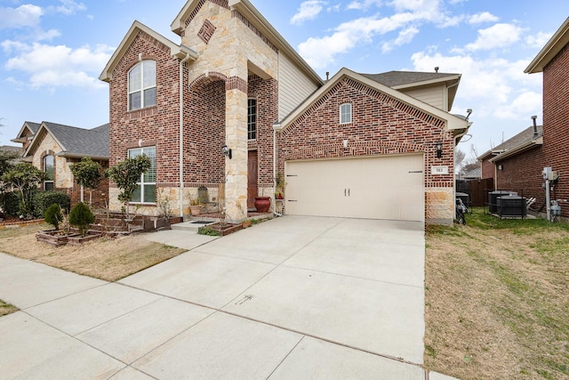 view of front property featuring a garage and a front yard