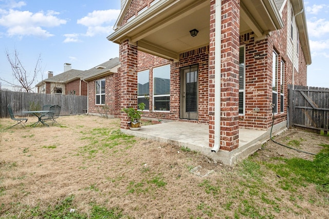 back of property with a patio area