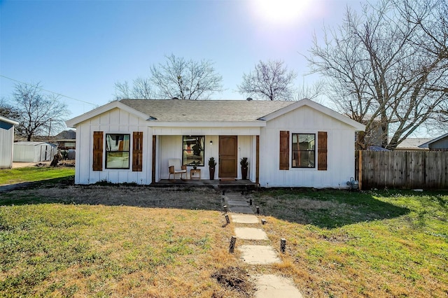 view of front of home with a front lawn