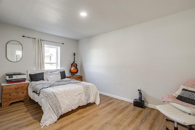 bedroom featuring light hardwood / wood-style floors