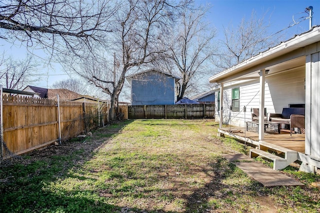 view of yard with a deck