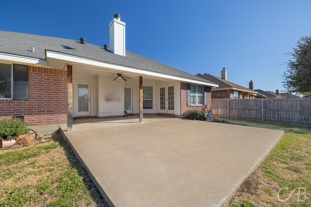 back of property with a patio and ceiling fan