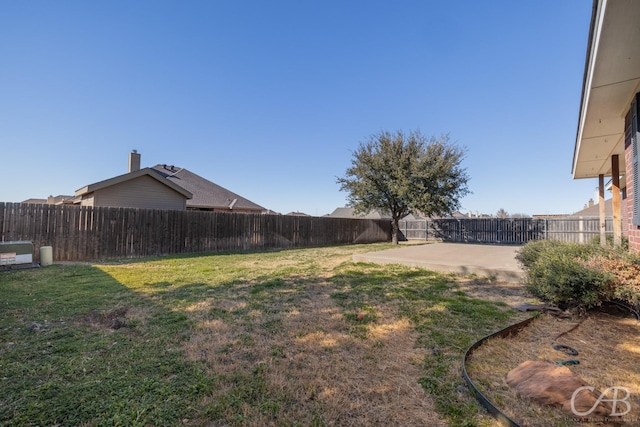 view of yard with a patio area