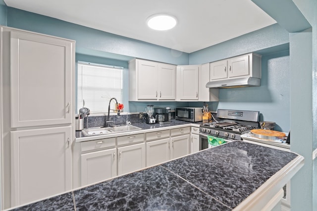 kitchen featuring white cabinetry, sink, and stainless steel appliances