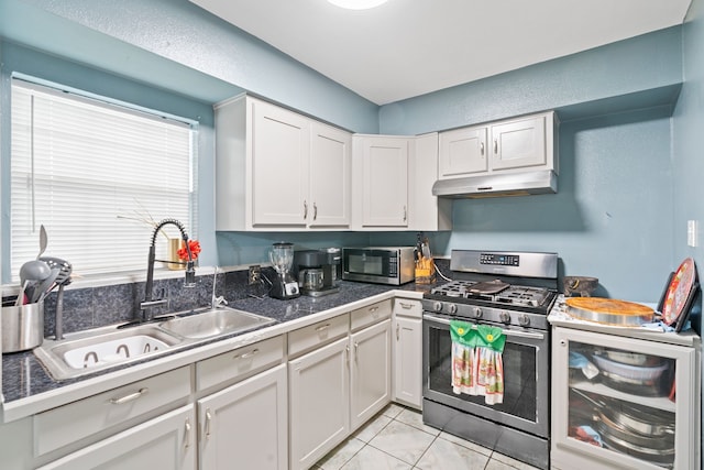 kitchen with white cabinetry, stainless steel appliances, sink, and wine cooler