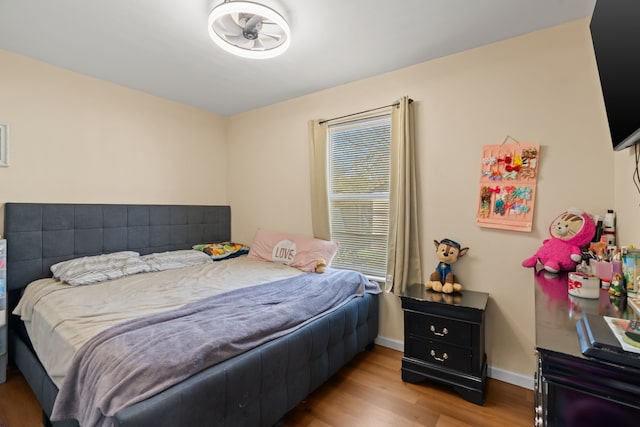 bedroom featuring hardwood / wood-style floors