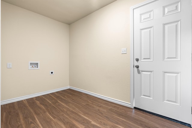 spare room featuring dark hardwood / wood-style flooring