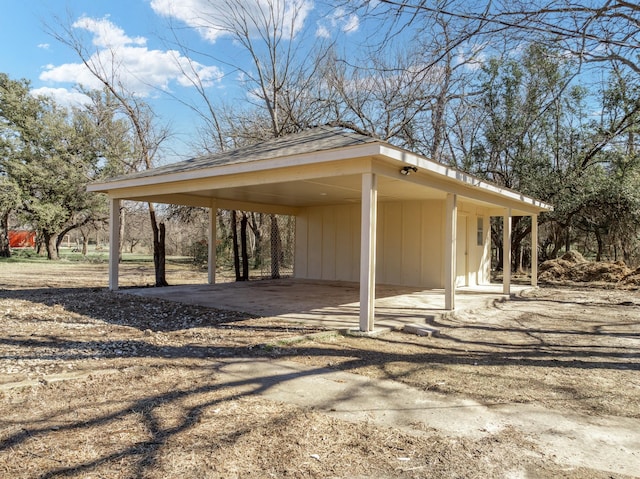 view of parking with a carport