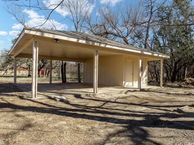 view of parking featuring a carport