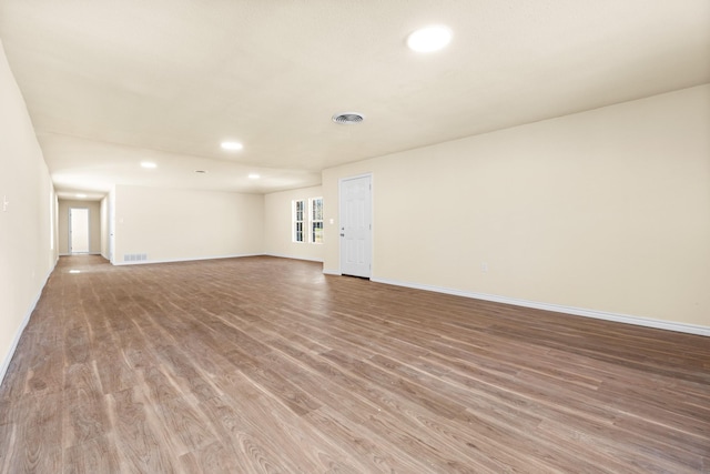 spare room featuring hardwood / wood-style flooring