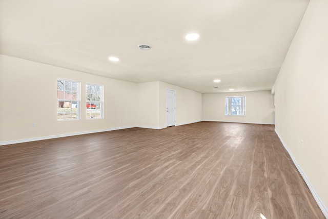 empty room featuring hardwood / wood-style flooring