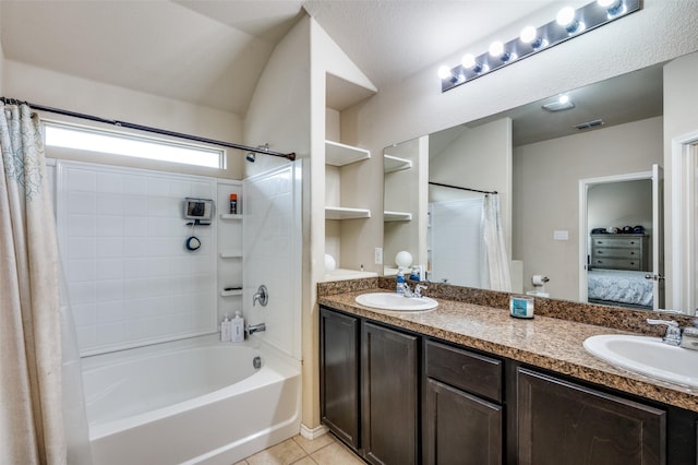 bathroom with tile patterned flooring, vanity, and shower / bath combination with curtain