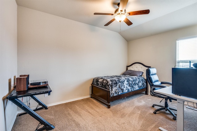 bedroom with vaulted ceiling, ceiling fan, and carpet