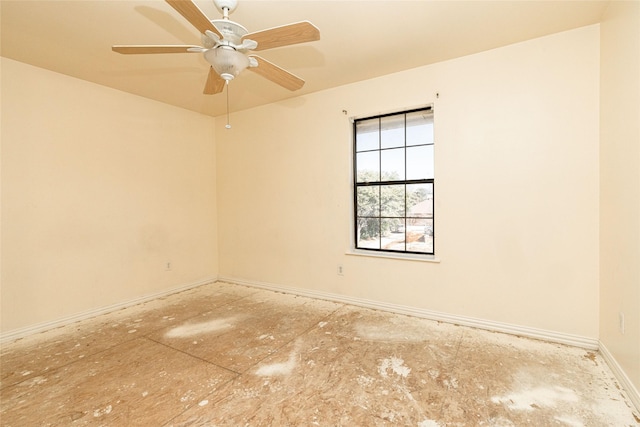 unfurnished room with ceiling fan