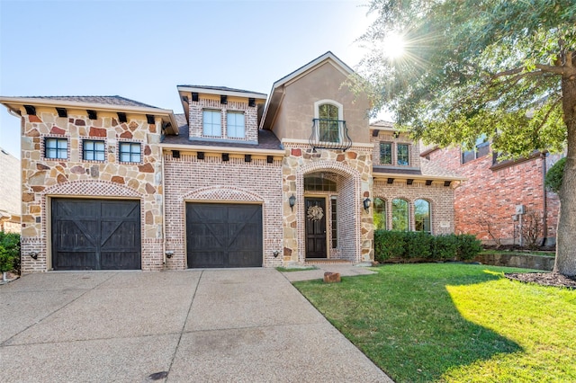 view of front of property featuring a garage and a front yard