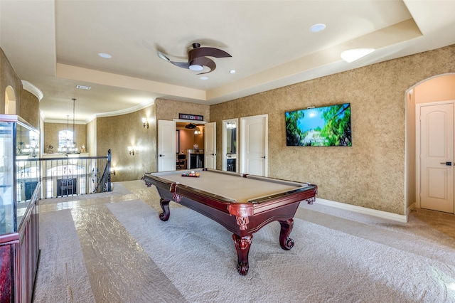 playroom with pool table, ornamental molding, light colored carpet, and a raised ceiling