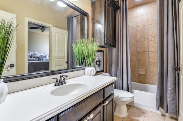 full bathroom with tile patterned flooring, vanity, toilet, and shower / bath combo with shower curtain