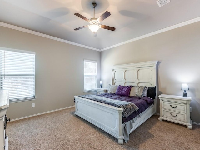 bedroom with light carpet, crown molding, and ceiling fan