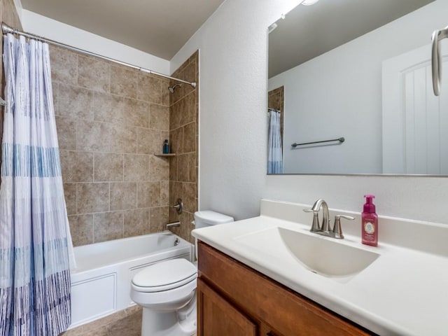 full bathroom with vanity, shower / bath combination with curtain, and toilet