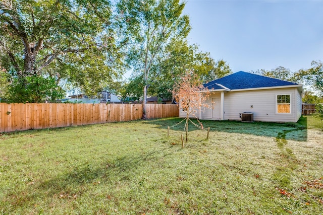 view of yard featuring central AC