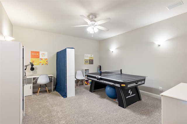 rec room featuring carpet floors and ceiling fan