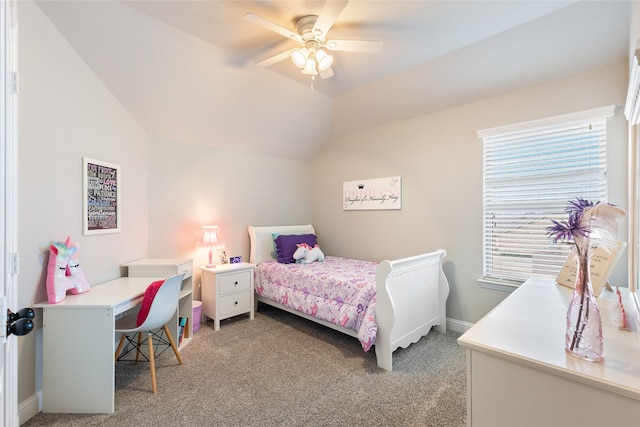 bedroom with vaulted ceiling, ceiling fan, and carpet