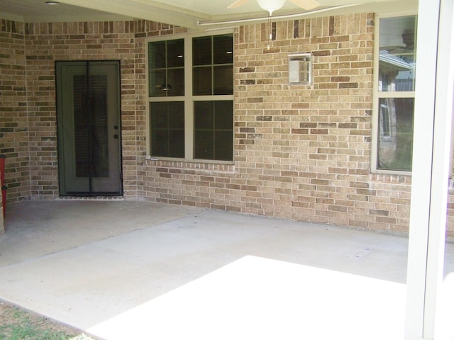 view of patio / terrace featuring ceiling fan