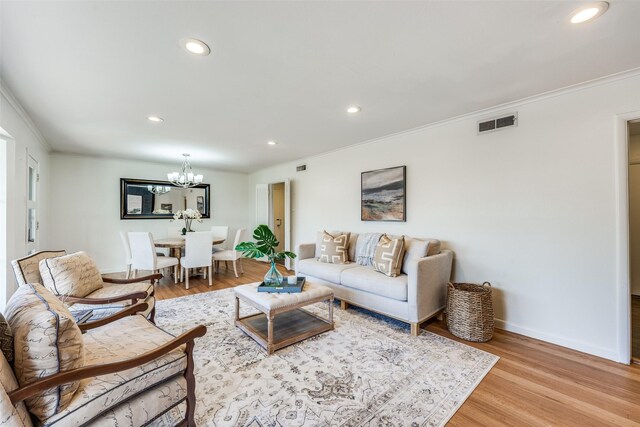 foyer with recessed lighting, light wood-style flooring, and baseboards