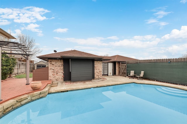 view of pool featuring a pergola and a patio area