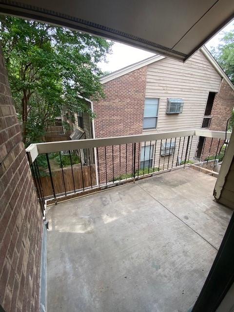 view of patio / terrace featuring a balcony