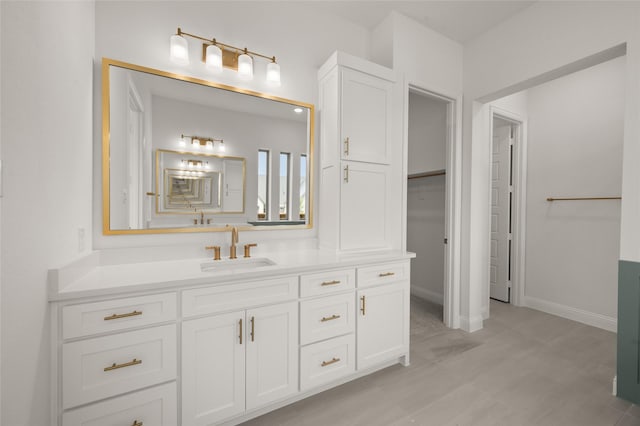 2301 Hawk Meadow Ct, Mansfield, TX 76063 - bathroom featuring vanity and baseboards