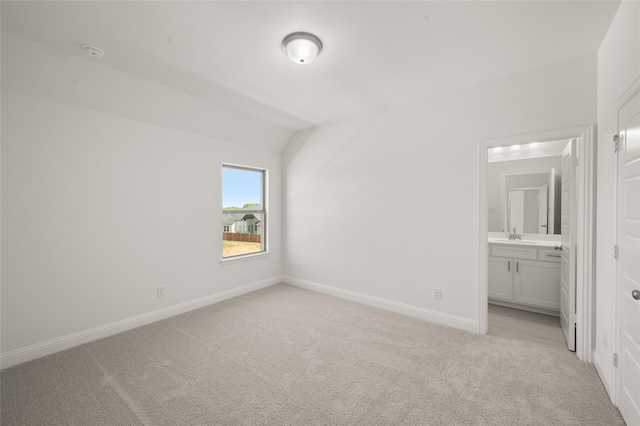 2301 Hawk Meadow Ct, Mansfield, TX 76063 - unfurnished bedroom featuring light colored carpet, lofted ceiling, and ensuite bathroom