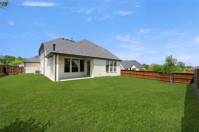 2301 Hawk Meadow Ct, Mansfield, TX 76063 - rear view of house featuring a fenced backyard, a shingled roof, and brick siding