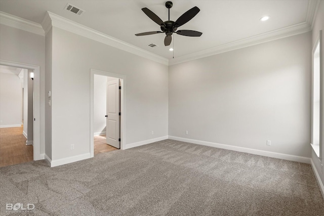 unfurnished bedroom with crown molding, ceiling fan, and light carpet