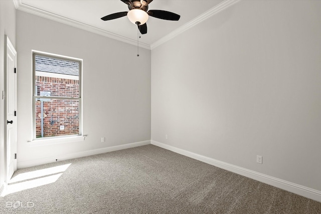 carpeted empty room featuring crown molding and ceiling fan