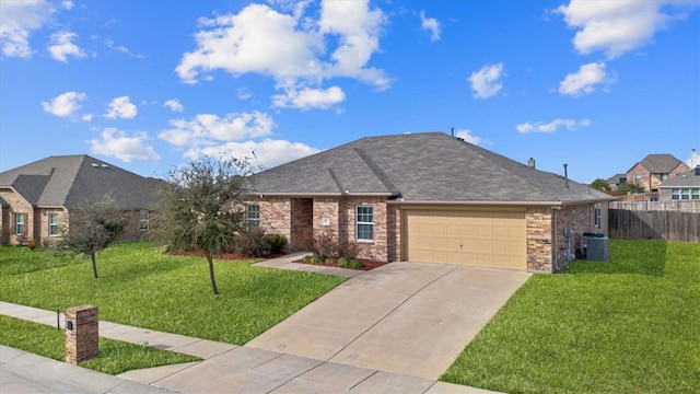 ranch-style home with a garage and a front lawn